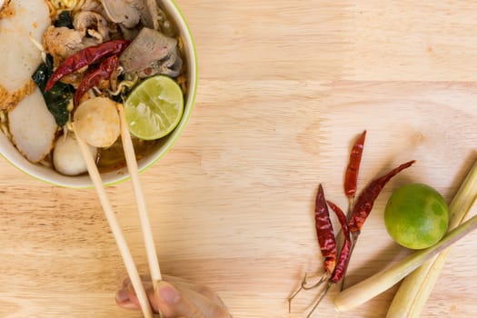 Tom Yum Spicy Soup Noodle with Fish Ball and Pork : Popular Thai Food