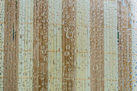 Water drop, droplet, raindrop of wooden mat background