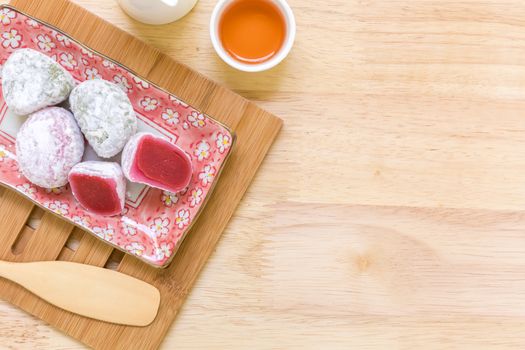 Daifuku traditional Japanese dessert eaten with tea background.