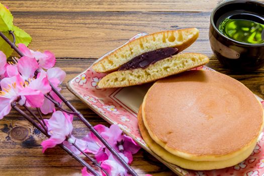 Dorayaki or Japanese pancake filled with red bean paste.