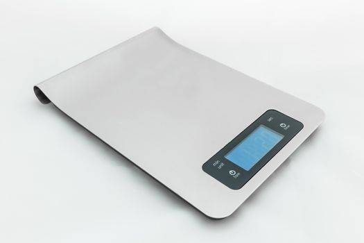 Digital food scale isolated on white background.