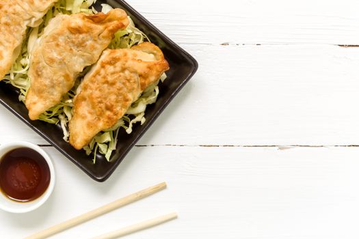 Gyoza, traditional pork dumpling, eaten with soy sauce popular in Japan and China.