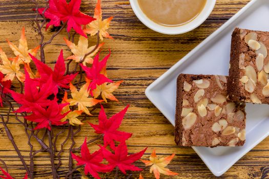 Chocolate almond brownie for relaxing coffee break.