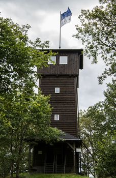 wooden lookout tower on mountain