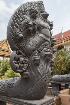 Mythical Seven-Headed Snake goddess, Khmer Naga sculpture, Buddhist temple Wat Preah Prom Rath in Siem Reap, Cambodia, Asia