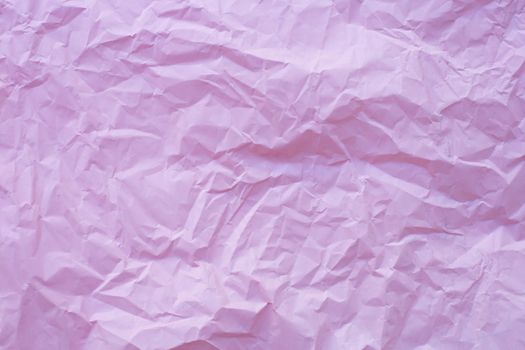 Pink crumpled recycle paper background
