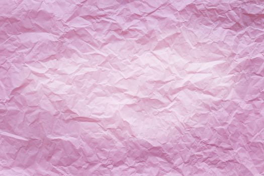 Pink crumpled recycle paper background