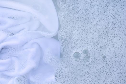 Soak a cloth before washing, white cloth