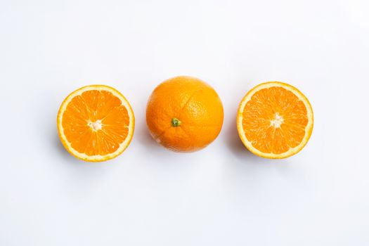 Top view of orange fruits isolated on white background.