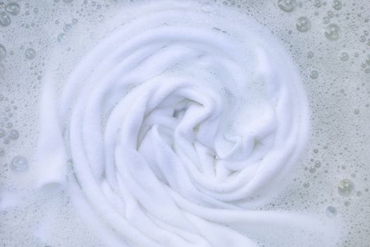 Soak a cloth before washing, white cloth