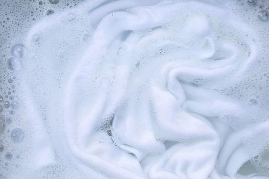 Soak a cloth before washing, white cloth