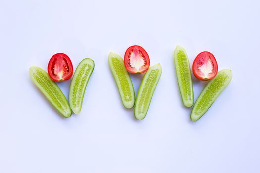 Tomatoes, Cucumbers, Natural ingredients for homemade skin care on white.