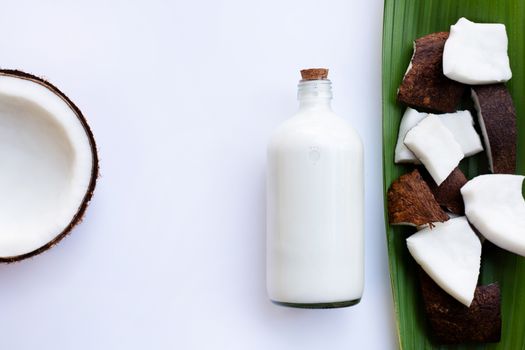 Coconut milk and coconut on  white background