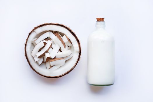 Coconut and coconut milk on white background.