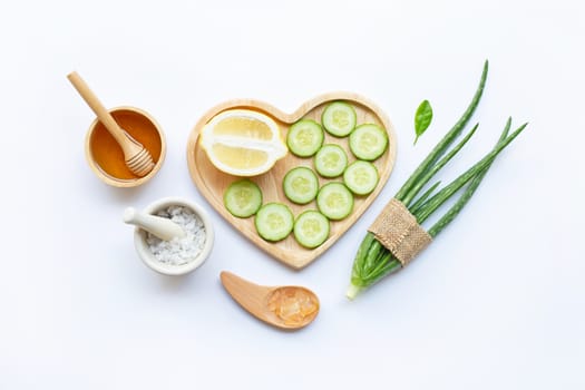 Aloe vera, lemon, cucumber,  salt, honey. Natural ingredients for homemade skin care on white background.
