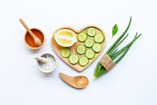 loe vera gel, lemon, cucumber, salt, honey. Natural ingredients for homemade skin care on white.