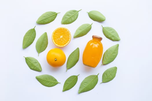 Orange with  green leaves and Orange juice isolated on white background.  Top view