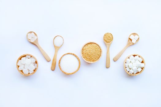 Various types of sugar on white background.