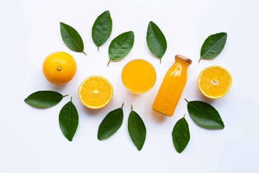 Orange with  green leaves and Orange juice isolated on white background.  Top view