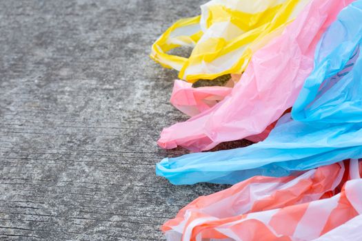 Plastic garbage bags on cement floor. Copy space