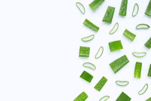 Aloe Vera cut pieces with slices on  white background. Copy space