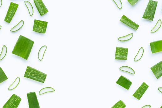 Frame made of Aloe Vera cut pieces with slices on  white background. Copy space