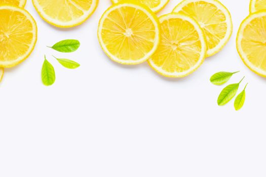 Frame made of fresh lemon with slices on white background. Copy space