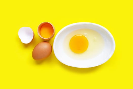 Eggs on yellow background.   Top view