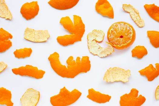 Orange with peel on white background. Top view