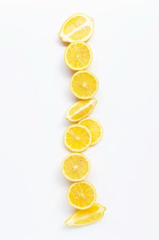 Fresh lemon slices on white background. Copy space