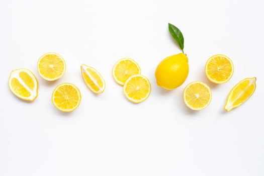 Fresh lemon with slices on white background.