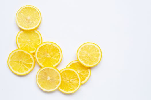 Fresh lemon slices on white background. Copy space