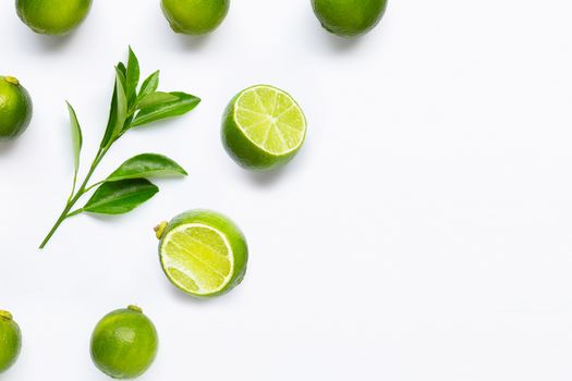 Limes isolated on white background. Top view
