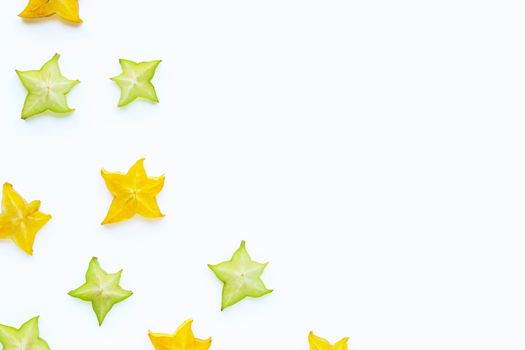 Ripe star fruit on white background. Copy space