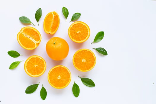 Fresh orange citrus fruit with leaves isolated on white background. Juicy and sweet