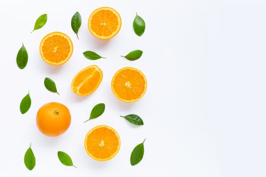Fresh orange citrus fruit with leaves isolated on white background. Juicy and sweet