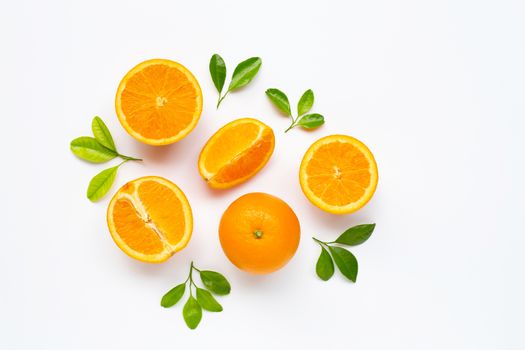 High vitamin C. Fresh orange citrus fruit with leaves isolated on white background.