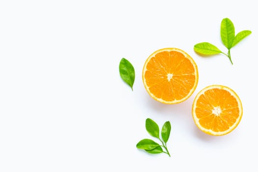 Fresh orange citrus fruit with leaves isolated on white background. Copy space