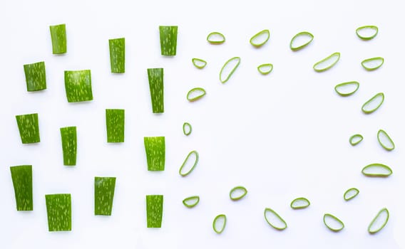 Aloe Vera cut pieces with slices on white background. Copy space