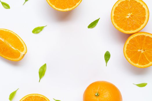 Frame made of fresh orange citrus fruit with leaves isolated on white background. Juicy and sweet