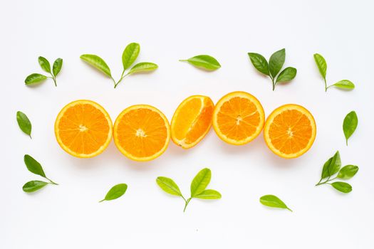 High vitamin C. Fresh orange citrus fruit with leaves isolated on white background.