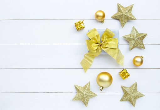 Merry Christmas and Happy Holidays, Christmas composition. gift box and decorations on white wooden background. Top view