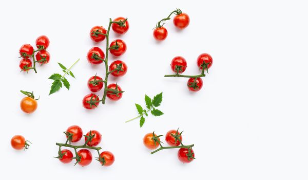 Fresh cherry tomatoes on white background.