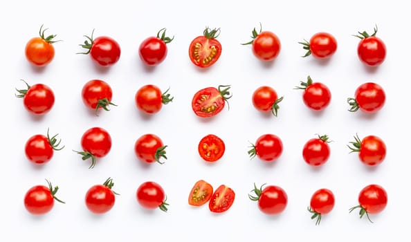 Fresh tomatoes, whole and half cut isolated on white background. Top view