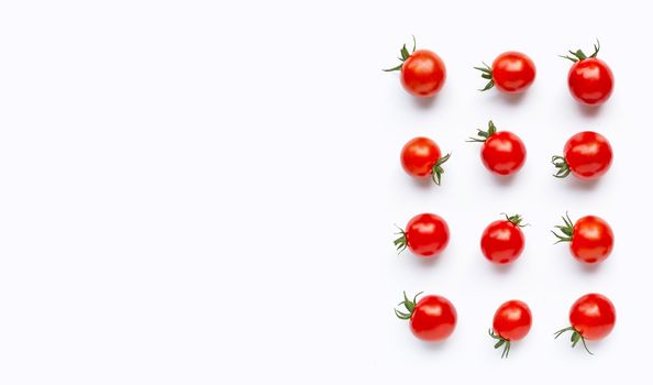 Fresh cherry tomatoes on white background. Copy space