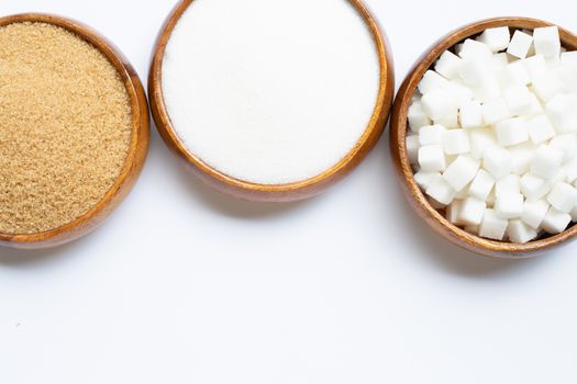 Various types of sugar on white background. 
