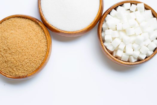 Various types of sugar on white background. Copy space