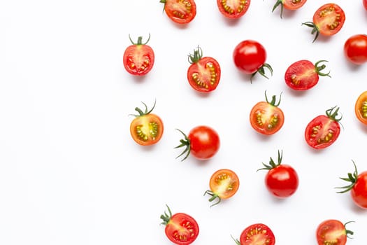 Fresh tomatoes, whole and half cut isolated on white background. Copy space