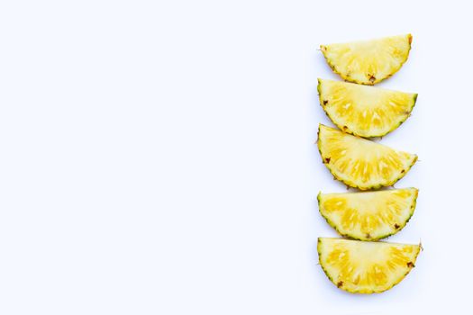 Fresh pineapple on white background. Top view with copy space