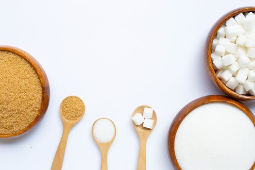 Various types of sugar on white background. Copy space